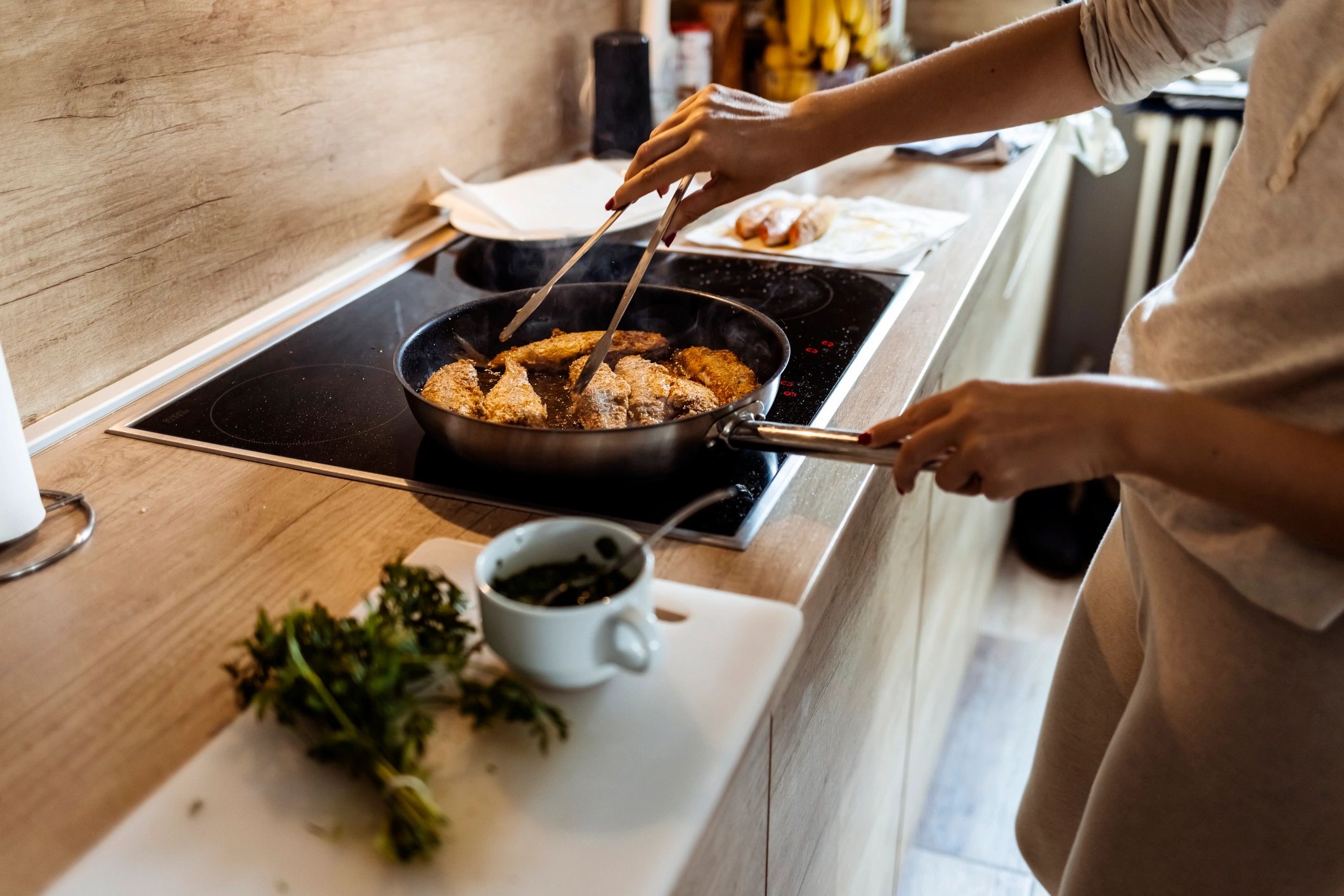 Customer cooking in a home kitchen